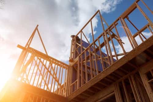 New construction home framing prepared for spray foam insulation in New Jersey